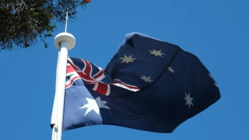 Australia flag with blue sky background