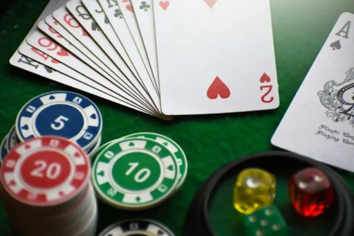 Gaming table with game chips, cards and dices. LATAM gambling market